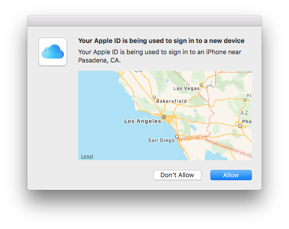 “Your Apple ID is being used to sign in to a new device” with a small map and Don’t Allow and Allow buttons, the latter the default, as seen on a Macintosh