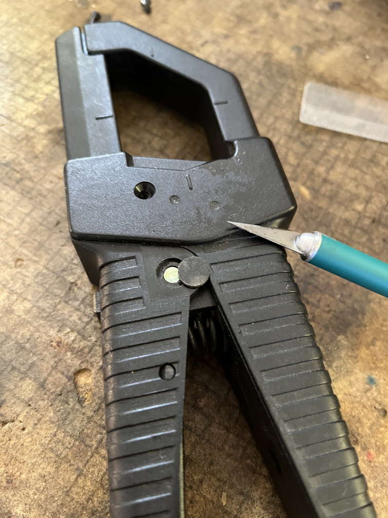 Hinge pin cover removal with sharp pointy tool