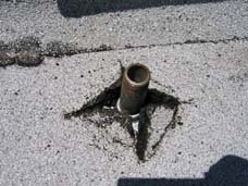 Pipe is installed in floor flange on roof
